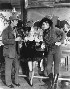 Images Dated 5th August 2013: VIRGINIA CITY, from left, Randolph Scott, Miriam Hopkins, Errol Flynn, 1940