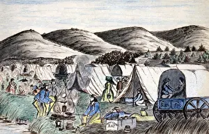 Westward Bound Prints: Wagon Train to the West. A wagon train of settlers camps on the Hymboldt River