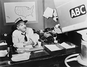 Winchell Prints: Walter Winchell, during the television broadcast of his weekly radio gossip program