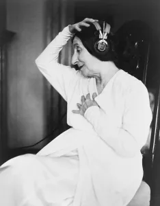 Headphones Prints: Wanda Landowska (1879-1959), Polish-born harpsichordist wearing headphones as she listens to music