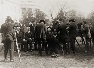 Fall Prints: Warren G. Harding (1865-1923), with members of his cabinet and photographers on the White House lawn
