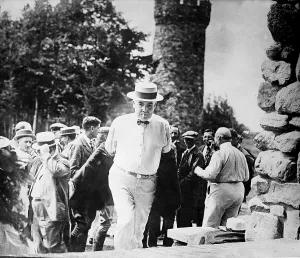 Images Dated 23rd October 2008: Warren G. Harding (1865-1923), smokes a cigarette in public. Ca. 1920