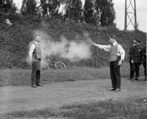 December Prints: Washington, D.C. law enforcers test a new bullet proof vest in 1923