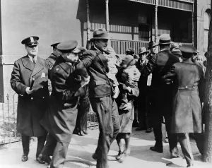 Protests Prints: Washington D.C. Police arrest a man carrying child as others look on during a Depression era protest of unemployed