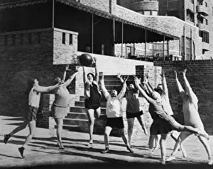 Exercise Prints: Washington society women working out with a medicine ball in Washington