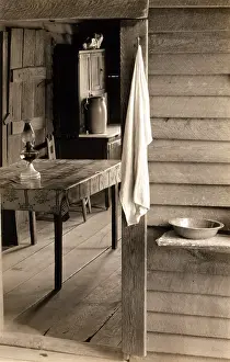 Depression Prints: A washstand in the dog run and view into the kitchen in the home of Floyd Burroughs