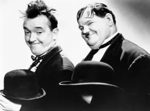 Messy Hair Prints: WAY OUT WEST, from left, Stan Laurel, Oliver Hardy, 1937
