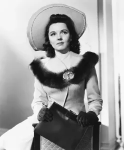 Picture Hat Prints: WEEKEND FOR THREE, Jane Wyatt, in a beige wool suit trimmed in fur, 1941