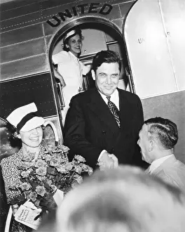 Edith Prints: Wendell and Edith Willkie are greeted as the exit they United Airlines DC-3 campaign plane