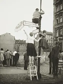 Communism Prints: West Berliners in the French sector waved to friends and relatives in East Berlin
