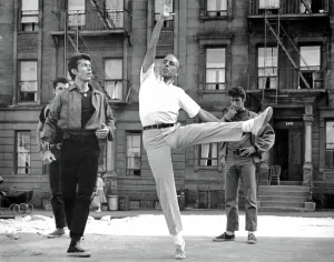 Rehearsal Prints: WEST SIDE STORY, George Chakiris gets some dancing moves from co-director