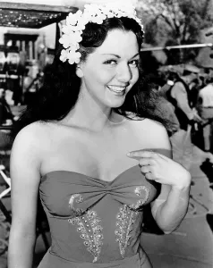 Flowers In Hair Prints: WHITE SAVAGE, Maria Montez, on-set, 1943