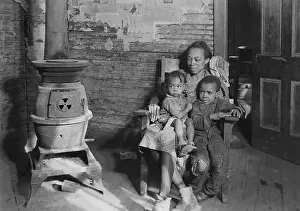 Dwellings Prints: Wife and children of an unemployed African American coal miner in Scott's Run