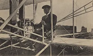 Flyers Prints: Wilbur Wright sits at the controls of his airplane