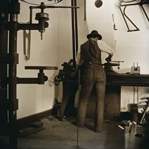 Bicycle Prints: Wilbur Wright works in the bicycle shop at Dayton