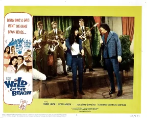 June Prints: WILD ON THE BEACH, from left, front, Cher, Sonny Bono, (backed by The Astronauts), 1965