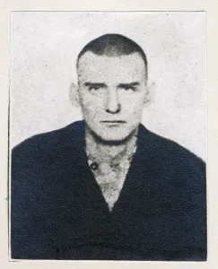 Outlaw Prints: Wild West. Dave Merrill, mug shot, in prison garb, 1902