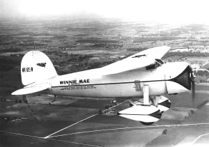 Airplane Prints: Wiley Post's plane WINNIE MAE overhauled for his solo round the world flight set for July