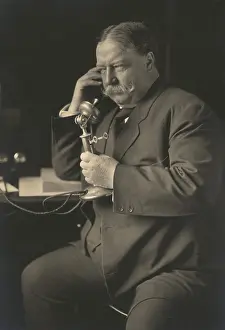 Autograph Prints: William Howard Taft, smiles as he learns by telephone of his Republican nomination for President