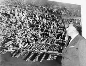 Tycoons Prints: William Zeckendorf 1905-1976 Real estate tycoon and developer looking at wall photo of New York City