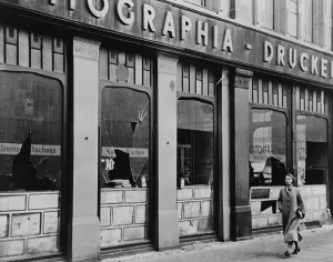 Pogroms Prints: Windows of a Jewish owned printing business smashed during Kristallnacht