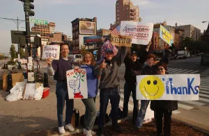 Support Prints: Well wishers near Ground Zero waving at passing vehicles entering the recovery site