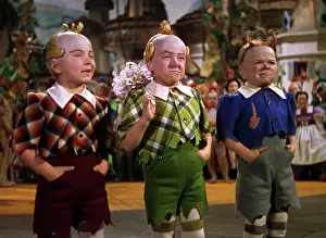 Jackie Prints: THE WIZARD OF OZ, from left, Jackie Gerlich, Jerry Maren, Harry Earles, 1939