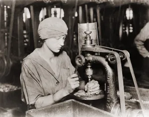 Factories Prints: Woman countersinking a detonator tube hole in hand grenade at Westinghouse Electric & Manufacturing