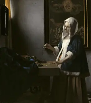 Three Quarters Length Prints: Woman Holding a Balance, by Johannes Vermeer, c. 1664, Dutch painting, oil on canvas
