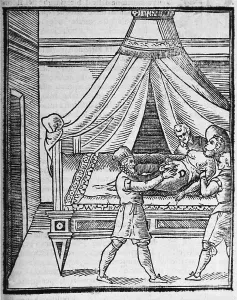 Woodcuts Prints: A woman lying on a bed is being restrained by two male assistants while the surgeon extracts the infant during a