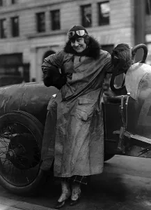 Images Dated 29th June 2010: Woman with race car ca. 1920s