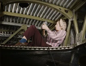 Machinery Prints: Woman war worker riveting an A-20 bomber