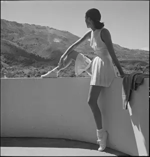 Tennis Prints: Woman wearing tennis outfit, seated on wall