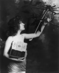 Raised Arm Prints: Woman wearing a winged costume and holding box of Robert Burns cigars
