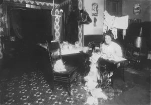 Apartment Prints: Woman working in basement, from caption: Annie Maier (or Meyer)