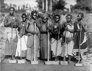 Forced Labor Prints: Women convicts working on road while chained together by neck rings in Tanganyika