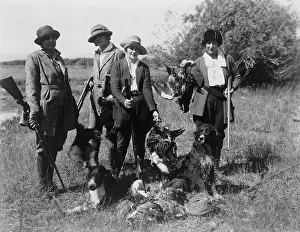 Hunters Prints: Five women hunters posed with their guns