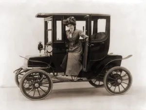Old Technology Prints: Women steps from an electric car. 1908
