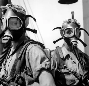 Indiana Prints: Women war workers wear oxygen masks while cleaning at U