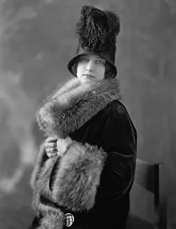 Formal Dress Prints: Women wearing fur lined velvet coat with opulent fur collar and cuffs