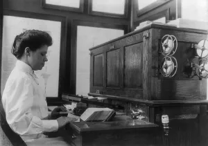 Punch Cards Prints: Women working with punch cards at an early tabulating machine at the U