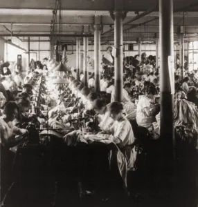 Sewing Machines Prints: Women working at sewing machines in factory in Leicester, England. 1923