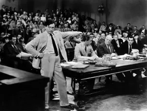 Courtroom Prints: THEY WON'T FORGET, Claude Rains (left), Edward Norris (right), 1937, accusation