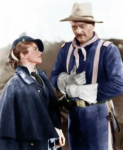 Images Dated 6th August 2014: SHE WORE A YELLOW RIBBON, from left: Joanne Dru, John Wayne, 1949