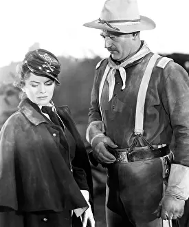 Civil War Uniform Prints: SHE WORE A YELLOW RIBBON, from left, Joanne Dru, John Wayne, 1949