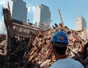 Twin Towers Prints: Worker at the pile of rubble from the collapse of WTC 2
