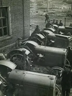 Russia Prints: Workers on American made McCormick Deering tractors at a Soviet Russian state dairy farm