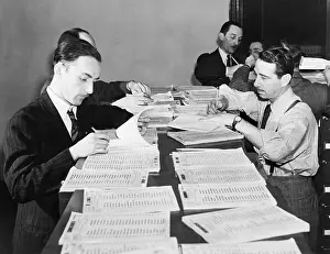 Conscription Prints: Workers checking names and numbers at New York Selective Service headquarters