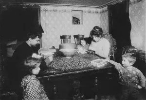 Nuts Prints: Working family, caption: Picking nuts in dirty basement