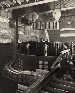 Machine Prints: Workmen installing a generator in the Norris Dam powerhouse
